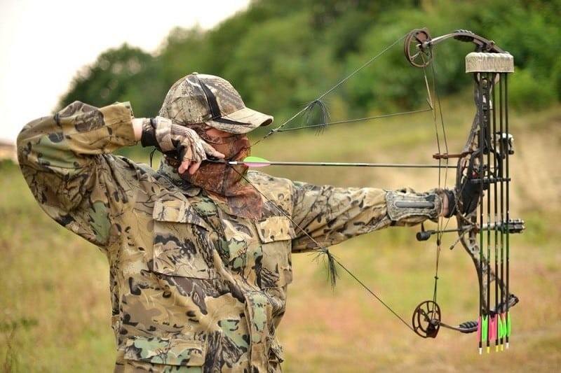 When should you carry arrows in the nocked position